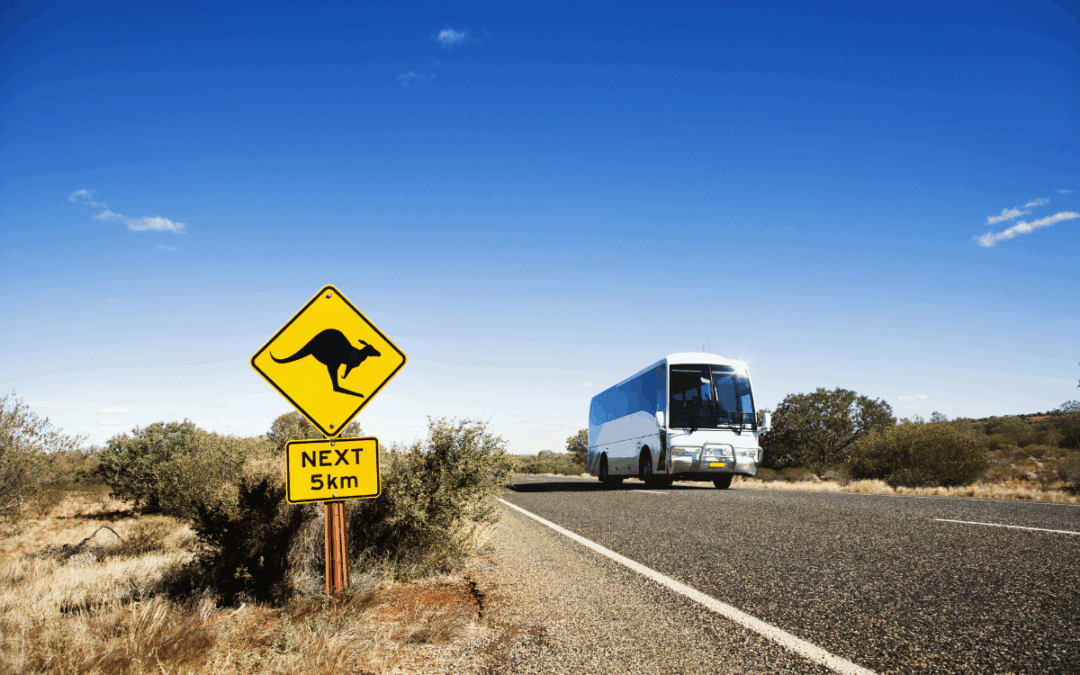 Bus Driving On Australian Country Road